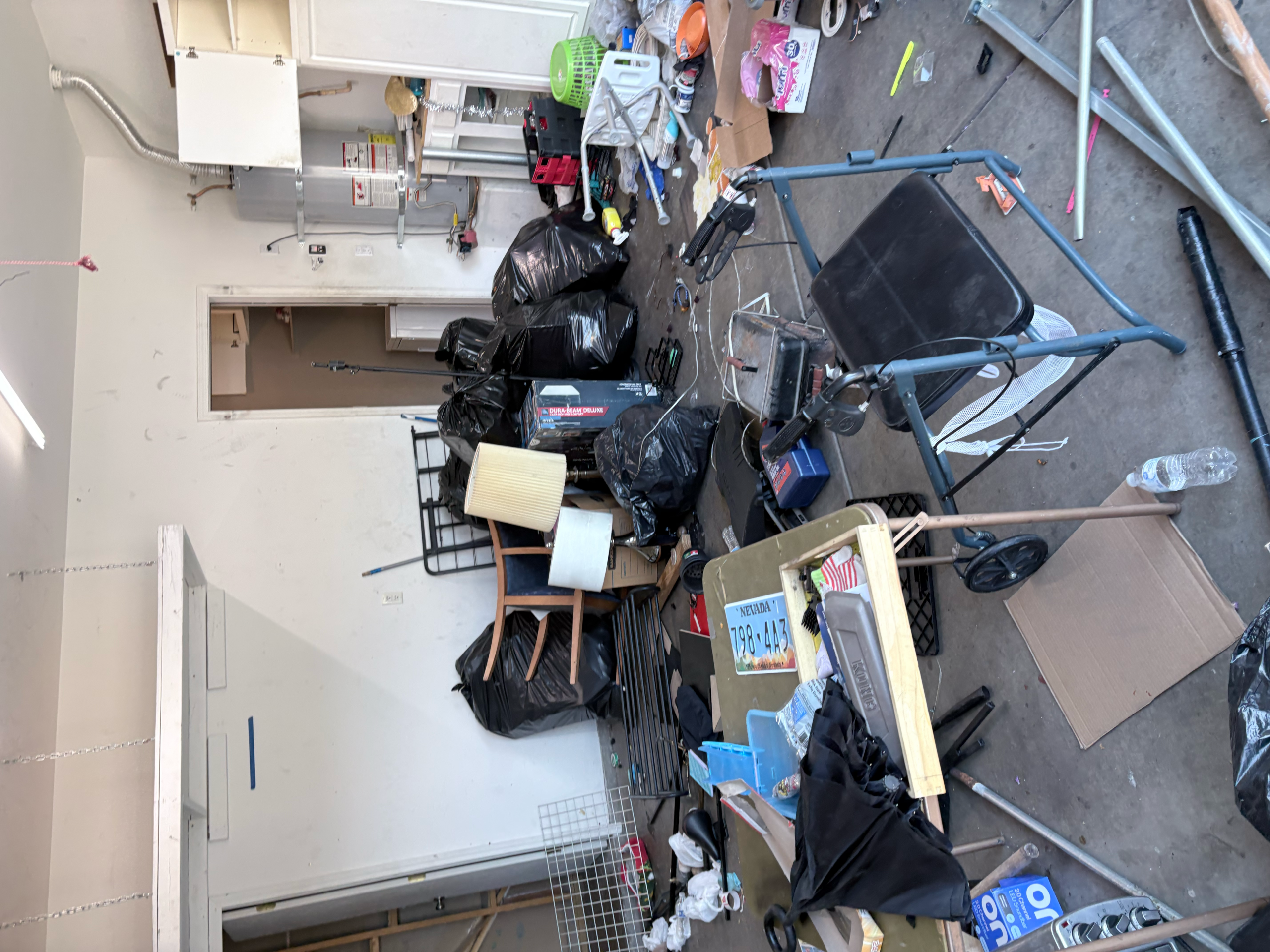 Before photo of rental property cleanout in Las Vegas with junk and debris